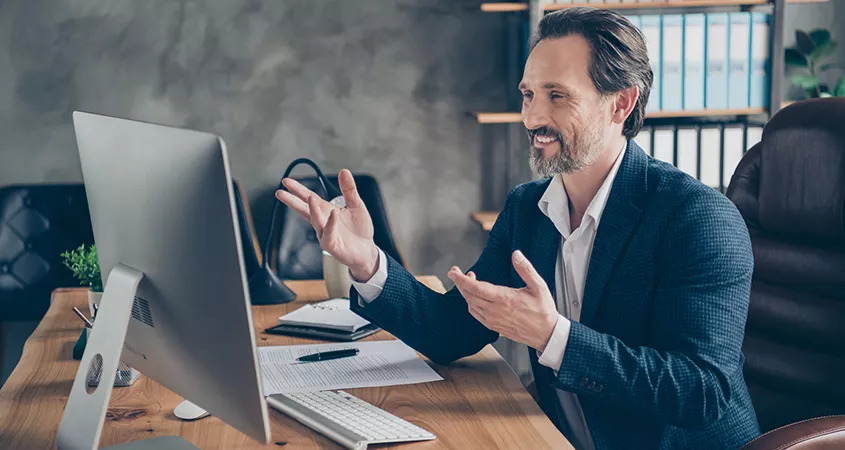 Profile side view portrait of his he nice handsome cheerful cheery man specialist attending web meeting discussing company development plan at modern concrete industrial work place station